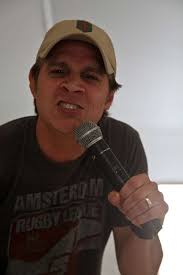 Comedian Danny Bevins performs during the Comics