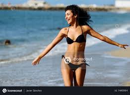 High by the beach (оригинал lana del rey). Young Arabic Woman With Beautiful Body In Swimwear Smiling On A Tropical Beach Photo Swimwear Arab Women Beautiful Bodies