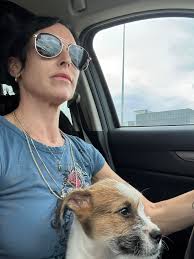 Who to call to return a found dog in Fulshear?