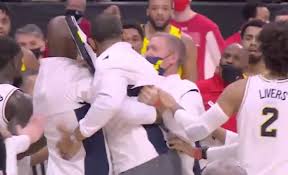 Video shows howard appearing to talk toward maryland's bench, causing a terrapin player to approach the coach. Wtj4jcglwjiyjm