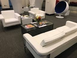 Our Lounge Sofas Chairs And Mib Ottomans On Display At A Conference Eventfurniture Eventprofs Rental Furniture Furniture Lounge Furniture