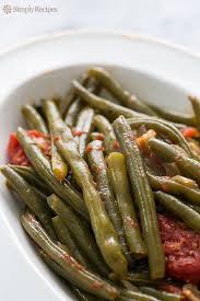 Green Beans With Tomatoes And Bacon Recipe Simplyrecipes Com Recipe Green Beans Green Beans And Tomatoes Slow Cooker Green Beans