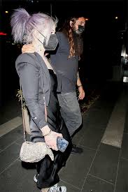 She posted a pic on instagram with a black shirt, light makeup. Kelly Osbourne Rocks A Silk Black Dress For Date Night With Erik Bragg Hollywood Life