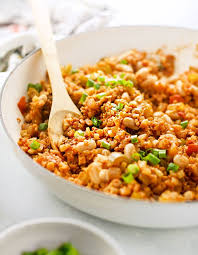 Healthy Creole Style Cauliflower Jambalaya This Quick Skillet Meal Is Low Carb Vegan And Paleo Friendly It Packs Whole Food Recipes Healthy Recipes Healthy