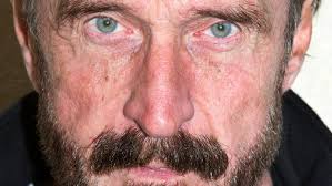 On the road -- and run -- with John McAfee