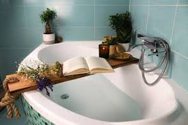 The bathtub tray is guaranteed to make your bath time more relaxing. The Best Stylish Bathtub Trays That Are Actually Affordable Bathroom Decor Apartment Therapy
