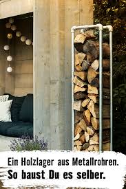 Ein Holzlager Der Anderen Art Rustikales Industriedesign So Baust Du Es Selber Garten Balkon Terrasse Garten Holzlager Diy Outdoor Mobel Industriedesign