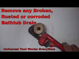 Sometimes drains need to be replaced due to rust or because the rubber gasket erodes over time. Youtube Learn How To Remove Any Stuck Bathtub Drain Weather Is Rusted Corroded Or Even If The Crossmember Is Broken Or Bathtub Drain Diy Bathtub Clean Bathtub