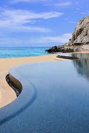 Curved Infinite Luxury Swimming Pools Luxury Pools Infinity Pool