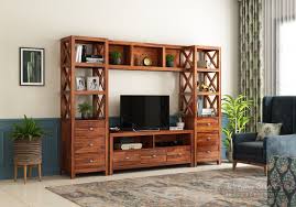 Browse through an assortment of tv stands, corner tv stands, wooden tv stands, lcd tv stands, modern tv stands, glass tv stands, metal tv stands, tv stands with shelves, etc. Buy Pippin Tv Unit Honey Finish Online In India Wooden Street