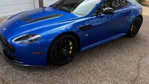 Image result for Concours Blue 2015 Aston Martin