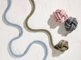 These Knot Cushions Are Not Your Normal Cushions The Knot Cushions Designed By Ragnheidur Osp Sigurda With Images Knot Cushion Knot Pillow Colourful Cushions