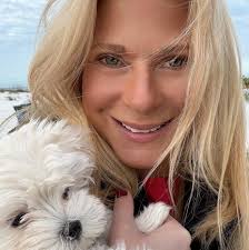 Cast member surprises guest with balloon at Disney