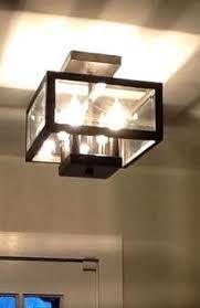 Hampton Bay Tallarook 11 In 4 Light Oxide Brass Semi Flush Mount Ceiling Light Ec3788obp The Home Depot Foyer Lighting Fixtures Hallway Light Fixtures Entryway Light Fixtures