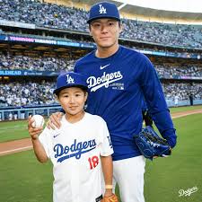 Yoshinobu Yamamoto wanted to surprise a special fan to throw out the first  pitch on his bobblehead night. Out of the hundreds of video submissions, he  chose 9-year-old Keita. 🥹