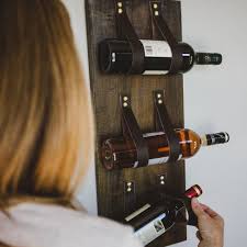 Make sure whatever rope you use is really stiff so it holds its shape and doesn't droop over time. Diy Wood Leather Wine Bottle Holder