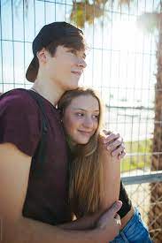 Use them in commercial designs under lifetime, perpetual & worldwide rights. Portrait Of A Teen Couple Smiling In Summer By Bonninstudio Summer Teenager Stocksy United