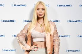 She is signed to t.i.'s grand hustle records. Iggy Azalea S Purple Dress See Photos Billboard