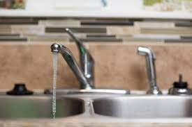 Use a small stiff brush to clean away any grit or mineral deposits from the screen and other parts of the aerator assembly. How To Replace A Kitchen Sink Sprayer