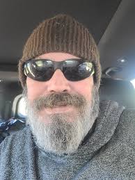 My current hiking look, should I trim the beard or go full