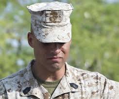 U.S. Marine Corps Master Sgt. Adam Newsum pauses while