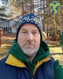 For 30 years, Peter Cobb from Chatham area schools (Winston Churchill and  King George VI) has been bringing groups to Tawingo. Here he signs our 10  Year Board for the third time