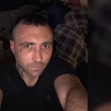 Killer who downed cocktail of medicine and cans of Budweiser stabbed a man  to death because he shouted at his daughter