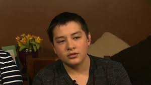 Kyle Laman: Student who faced the Parkland shooter is wheeled back into  school by the officer who saved him