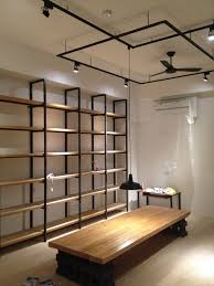 請問裝軌道燈需要另外做天花板嗎 store shelves design store interiors store design interior