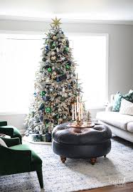 An impressive living room decoration is a festive mantle arrangement. Navy And Green Christmas Tree Christmas Tree Decor Ideas