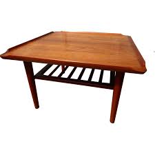 Danish modern fish tail teak surfboard coffee table with rack $ 1,850; Danish Teak Coffee Table By Holger Georg Jensen For Kubus 1960s For Sale At 1stdibs