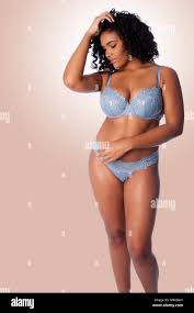 Happy beautiful sexy woman in bra and thong underwear lingerie Stock Photo  - Alamy