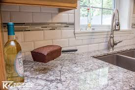 White Subway Tile With Accent Strip Kitchen Layout Kitchen Inspirations Coastal Kitchen