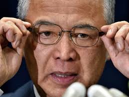 Japan's economy minister resigns over money scandal