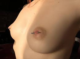 Natural boobs and nipple piercings..