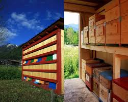 This Colorful Bienenhaus Is A Bee Castle That Provides Sanctuary For 16 Beehives Bee Houses Backyard Beekeeping Backyard