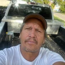 Who can recommend a roofer for a tear off and new shingles in Longtown?