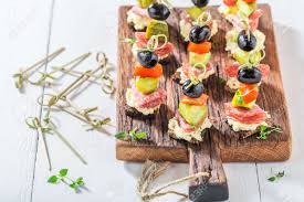 Warm salad of small octopuses and squids, fried murmansk squids, tiger shrimps salad, lighty salted salmon 550 g. Homemade Various Cold Snacks With Vegetables And Herbs For Snack Stock Photo Picture And Royalty Free Image Image 75613315