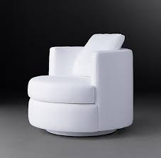 Rh Modern 39 S Wren Fabric Swivel Chair Defined By Soft Curves And Compact Proportions Our Wren Chair Offers Enveloping Comfort Swivel Chair Chair Big Chair