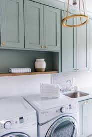 Double oven tall cabinet stack. Modern Craftsman Home In Indiana With Farmhouse Chic Accents Laundry Room Storage Grey Laundry Rooms Laundry Room Cabinets