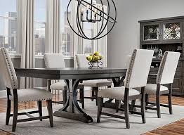When It Comes To The Halloway 7 Piece Dining Set Strong Lines And Eye Catching Detail Create A Transi Dining Sets Modern Modern Dining Dining Room Table Decor