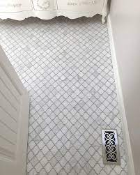 It can sound daunting, but we'll show you the equipment & planning the video above and steps below detail how to tile a bathroom floor, but the methods apply to all. Big Time Savings 10 00 Sq Ft While Supplies Last Carrara Arabesque Lantern Mosaic Arabesque Tile Bathroom White Marble Bathrooms Trendy Bathroom