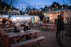This Food Cart Pod On S E Division Street Combines Mobile Eateries Offering International Fare A Beer Garden B Portland Travel Food Cart Portland Food Carts