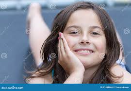 Pretty girl lying down stock image. Image of lifestyle