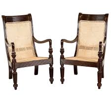 Pair Of Anglo Indian Or British Colonial Rosewood And Cane Library Chairs British Colonial Decor Colonial Furniture Furniture