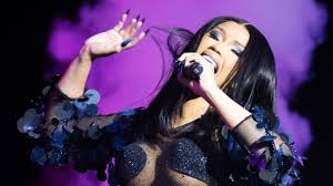 Cardi B furiously 'HITS' fan with microphone after concertgoer touched  rapper during explosive London performance | The Sun