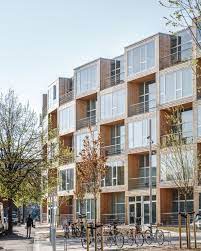 Big Builds Winding Wall Of Affordable Housing In Copenhagen Social Housing Architecture Architecture Bjarke Ingels