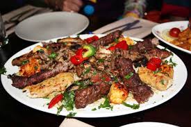 It is a gold plate used for holding food and it can normally be found with different types of food on it. Platter Dinner Wikipedia