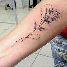 Rose tattoos typically symbolize love and beauty. 52 Unique Rose Tattoo Ideas Rose Tattoos Floral Tattoo Tattoo Models