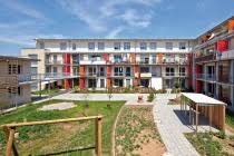 Schnell und sicher online buchen ; Bauverein Ag Setzt Auf Nachhaltiges Und Klimafreundliches Bauen Beispielhaftes Holz Hybrid Gebaude In Darmstadt Bundesbaublatt